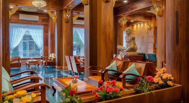Кровать в общем номере Ta Prohm Hotel & Spa
