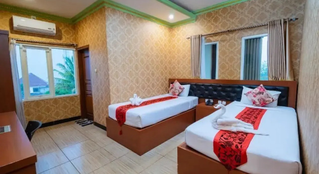 Deluxe double chambre avec balcon Grand Dream Cita Mandiri Syariah