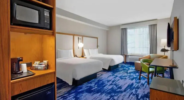 Четырёхместный номер Standard Fairfield by Marriott Inn & Suites Orlando at FLAMINGO CROSSINGS® Town Center