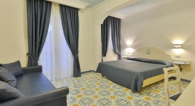 Четырёхместный номер Comfort Hotel La Pineta