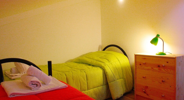 Кровать в общем номере Мансарда City-In Hostel B&B