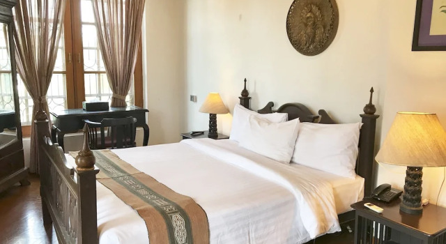 Двухместные апартаменты Classic с балконом Classique Inn