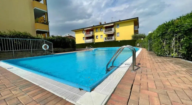 Апартаменты Garden Residence appartamento con terrazzo e piscina