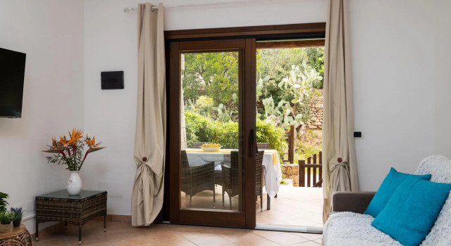 The apartment is located on two floors. The ground floor has a living room with sofa bed, with kitch-TRILO MIRTO, Book Lejlighed Golfo Aranci Emerald Coast