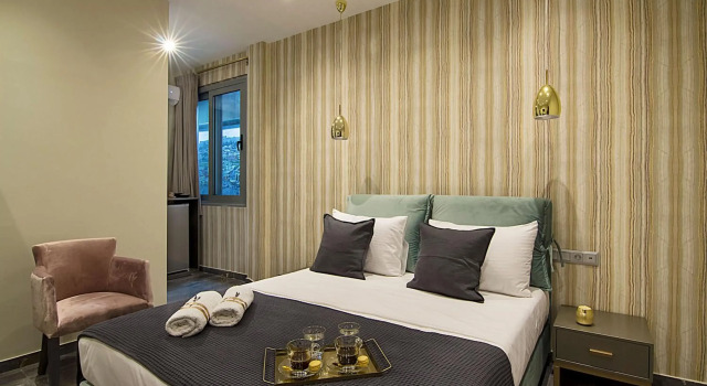 Athens Imperial Suites - Luxury Living, Забронировать Отель Афины Острова Саронического залива - Аттика, рядом с Theocharakis Foundation