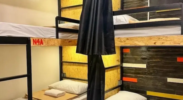 Кровать в общем номере Cafe Moto Hostel