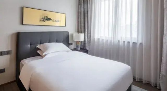 Люкс Premier с 3 комнатами с балконом и с видом на реку OYO Shenzhen Jinxi Hotel