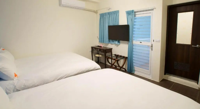 Standard Vierer Zimmer mit Balkon Trip Village-Hulks Homestay