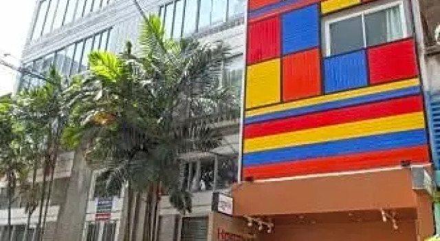 Кровать в общем номере Royal Asia Lodge
