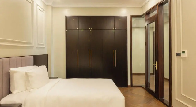 Семейные апартаменты с 2 комнатами с балконом и с видом на город Adamo Hotel Hung Yen