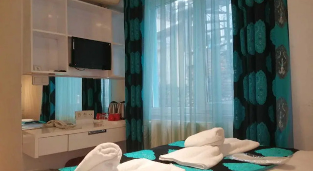 Трёхместный семейный номер Standard с видом на сад Minel Hotel