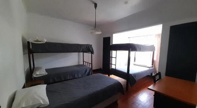 Кровать в общем номере Atacama Hostel Backpackers