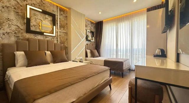 Четырёхместный номер Deluxe с видом на город Fourpoints Airport Hotel