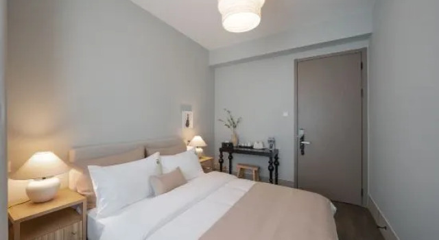 Люкс с 3 комнатами Shanghai Yuecheng Apartment (Haichang Ocean Park Yaoxue Ice and Snow World Branch)