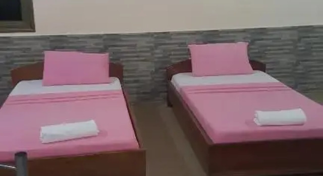 Кровать в общем номере Wli Water Heights Hotel