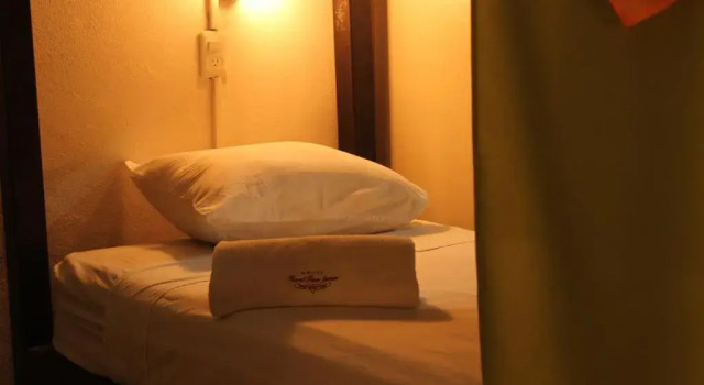 Vuode makuusalissa Hostal Real San Juan