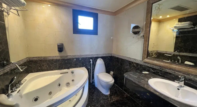Номер Royal Q Hotel