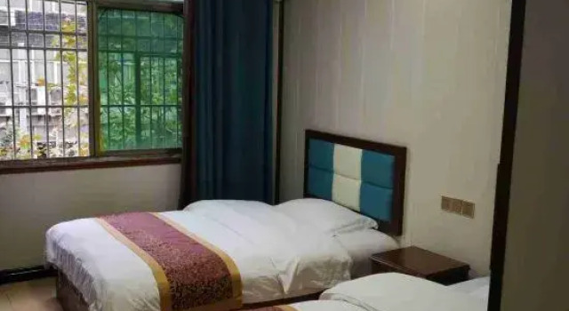 Enshi Xueyuan Hotel