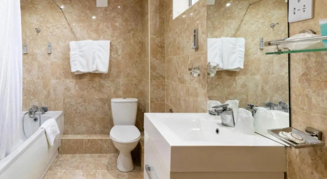 Четырёхместный номер Standard Stuart Hotel
