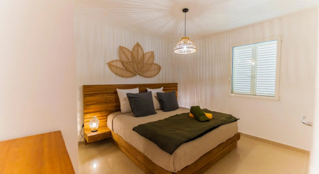 Le Baileys - Spacieux appartement en rez-de-jardin vue lagon, Prenota Appartamento Marigot San Martino