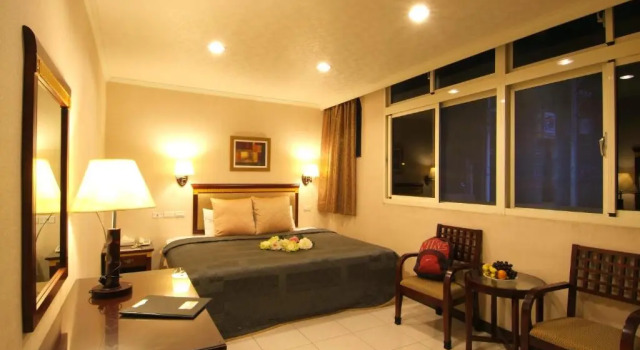 Номер Deluxe Puti Commercial Hotel