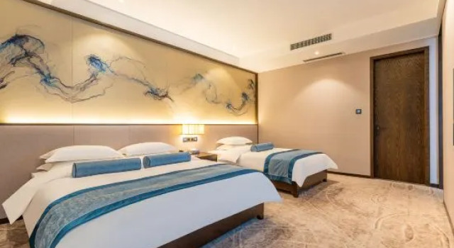 Семейный люкс Deluxe Fusheng Jiayue Hotel