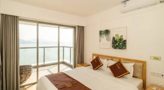 Люкс Deluxe с 2 комнатами с видом на море Shili Renjia Apartment (Huidong Yapojiao Flagship Store)