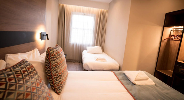Номер Deluxe Merit Kensington Hotel