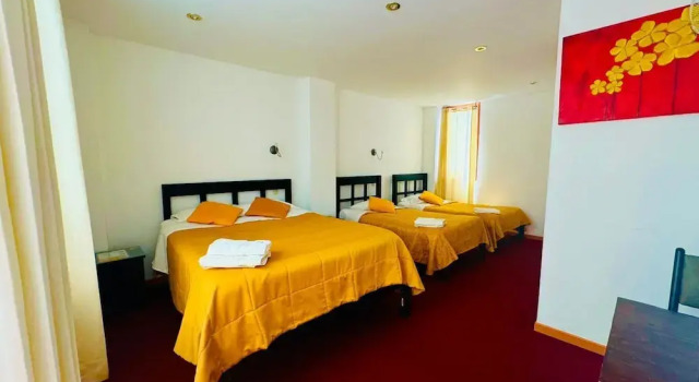 Classic czteroosobowy pokój Hotel Le Prince