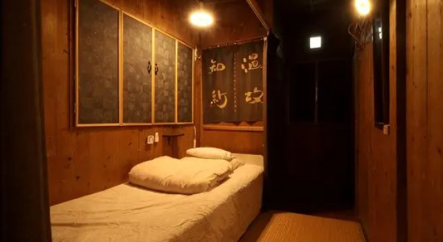 Кровать в общем номере Goyah-so Guesthouse