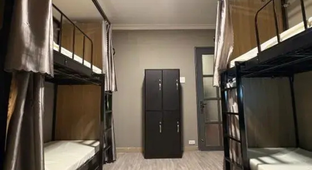 Кровать в общем номере Triple Hostel