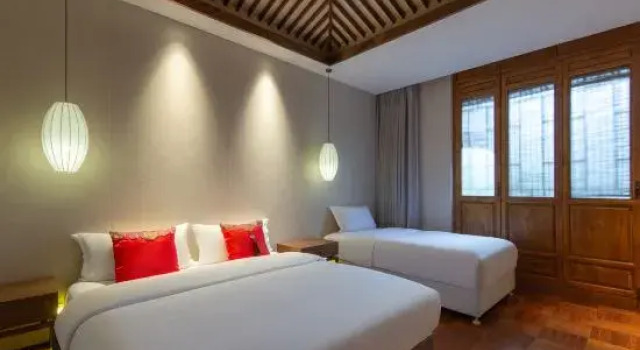 Двухместный семейный люкс Lijiang Meilunanzhao Mansion Hotel (Lijiang Shuhe Ancient Town Branch)