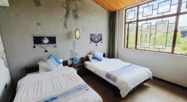 Люкс Xingyi Huayu Su Inn