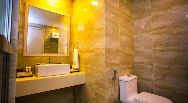Кровать в общем номере Austin Park Hotel