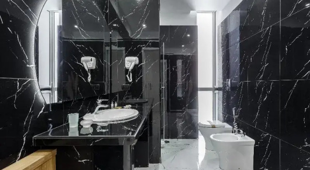 Четырёхместный номер Superior с балконом SantAngelo Suites