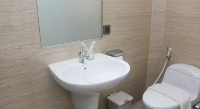 Коттедж Thongs Inn - KNO Kualanamu Transit Hotel