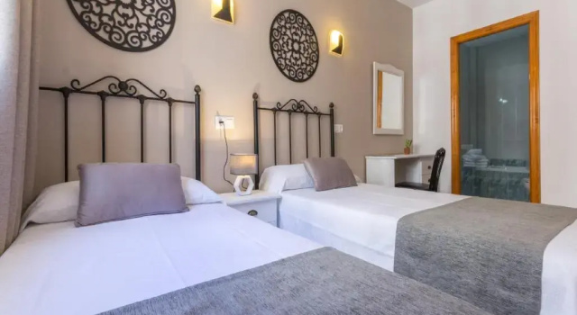 Четырёхместный номер Standard Hostal Dinamarca