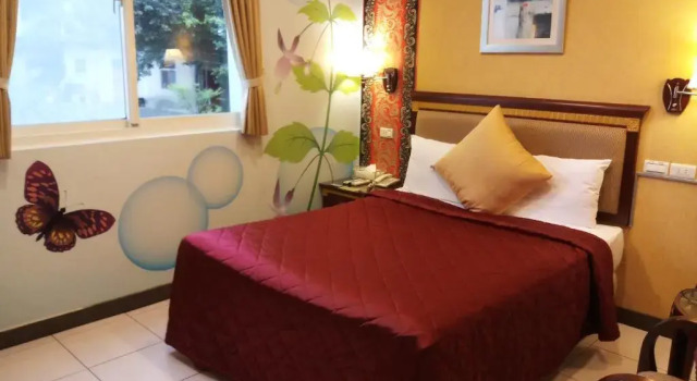 Номер Deluxe Puti Commercial Hotel