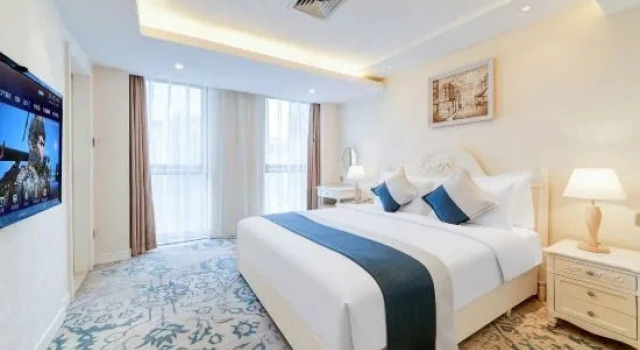 Четырёхместный семейный люкс Deluxe Xian Qu Jiang Yin Zuo Hotel
