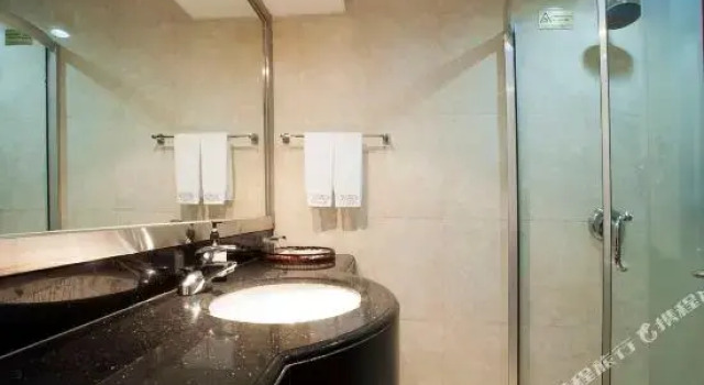 Люкс Deluxe Tian Bao International Hotel