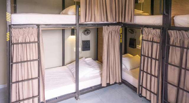 Кровать в общем номере Traveller Bunker Hostel