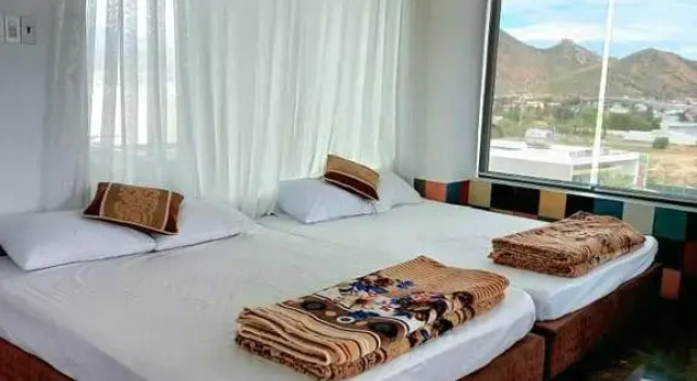 Кровать в общем номере Ninh Chu Hotel