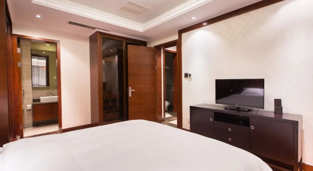 Люкс Deluxe с 3 комнатами с видом на город Qingdao Jinshan We Holiday Apt Wusi