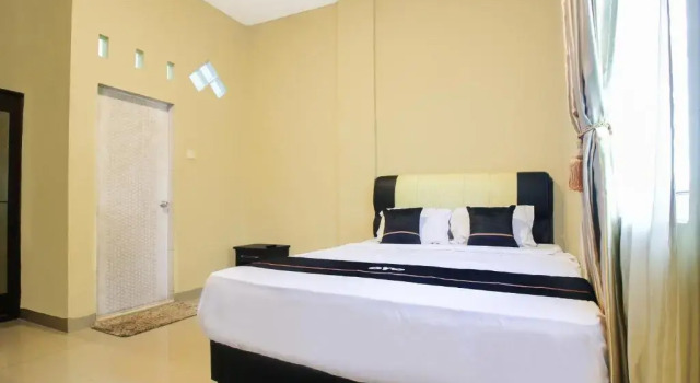 Люкс Deluxe OYO 2659 B'rasco Homestay Syariah