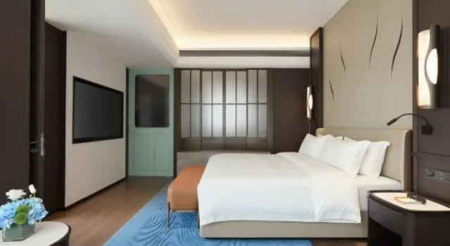 Suite 1 Schlafzimmer mit Flussblick Yintian Hotel