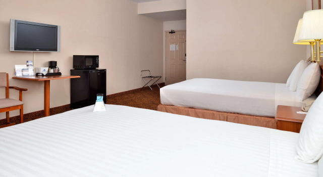 Четырёхместный номер Standard Americas Best Value Inn Westmorland