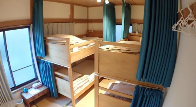 Кровать в общем номере Guesthouse SORA