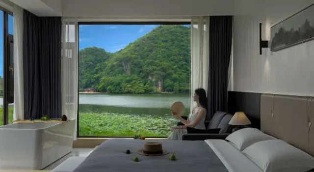 Семейный люкс с 2 комнатами с видом на озеро Muke Qianxun Lakeside Vacation Apartment (Puzhehei)
