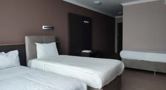 Четырёхместный номер Superior Hotel Taormina Brussels Airport