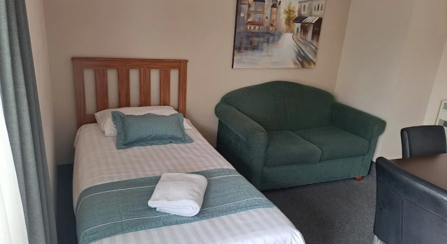 Семейные апартаменты c 1 комнатой Commodore Motor Lodge